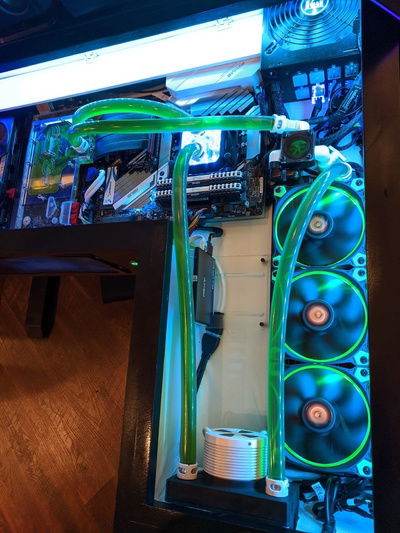 Gaming computer side of the desk.  Eventually I'll get a new primary GPU (3080???  If I can ever get one...) and the 1070ti will become my secondary, which I'll add to the server loop for true symmetry