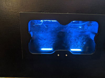 It looks scratched but those are micro-bubbles.  Even after a couple weeks and a couple times topping off the fluid, the bubbles still persist.

I later learned that I was running the pumps substantially faster than I needed to.