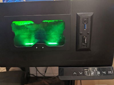 That's right, it can also be a standing desk at the push of a button!  Also, you can see my custom front I/O port here.  I made the face plate with Fusion 360 for the tool path, photoshop for the greyscale gradient, and a laser cutter to make the part.