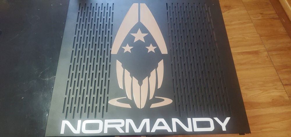 Side panel with Alliance System Navy and SPECTRE logos in chrome, and Normandy in white.