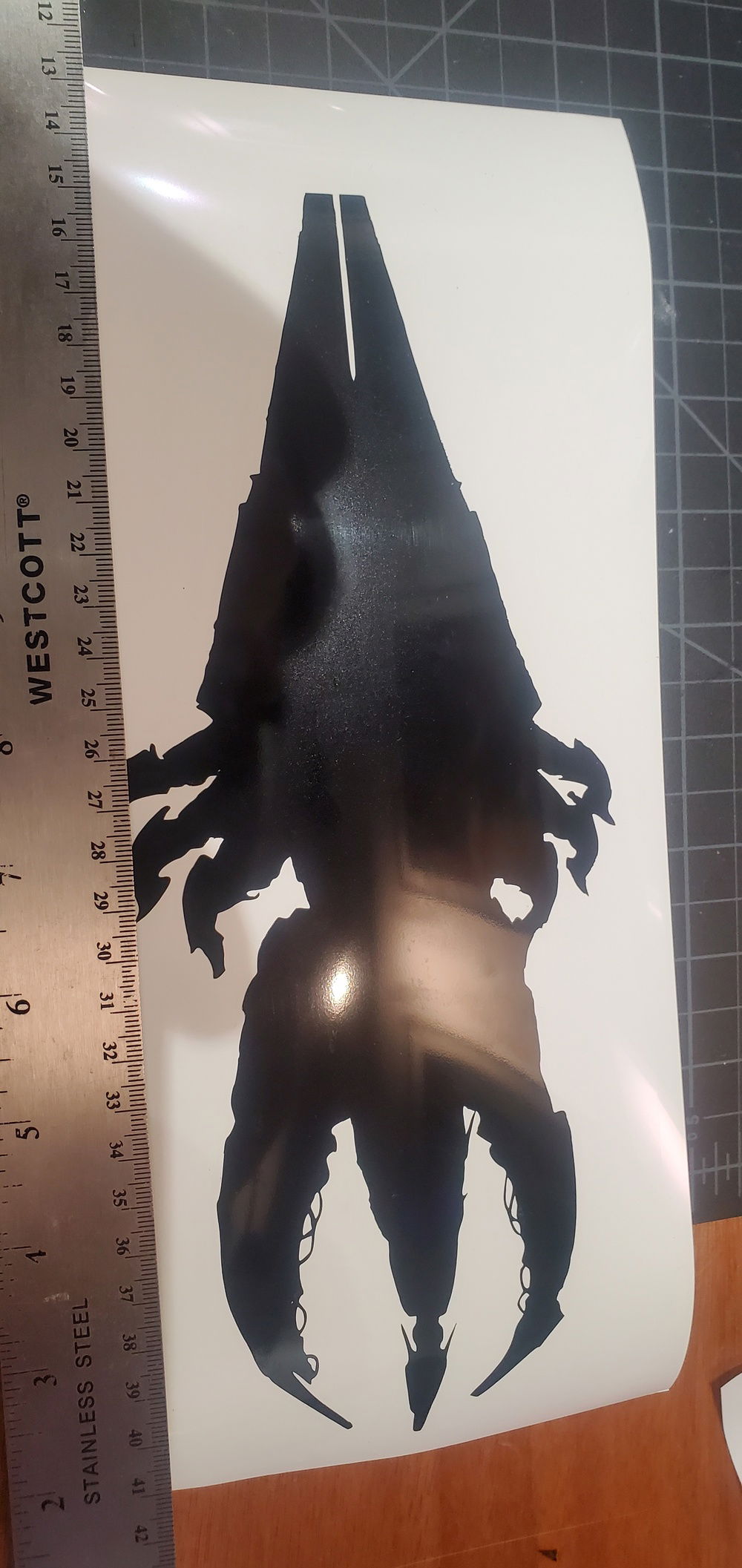 Vinyl cut on Cricut Joy for the Reaper on the front of the case.