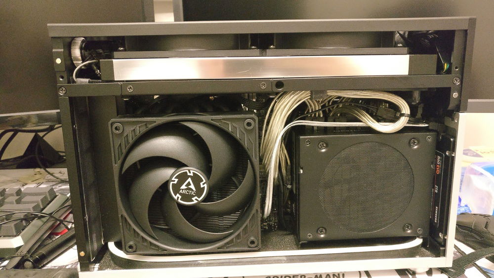 Arctic P12s, virtually silent under 1300rpm, can't be heard over the ambient noise coming from outside my closed apartment window