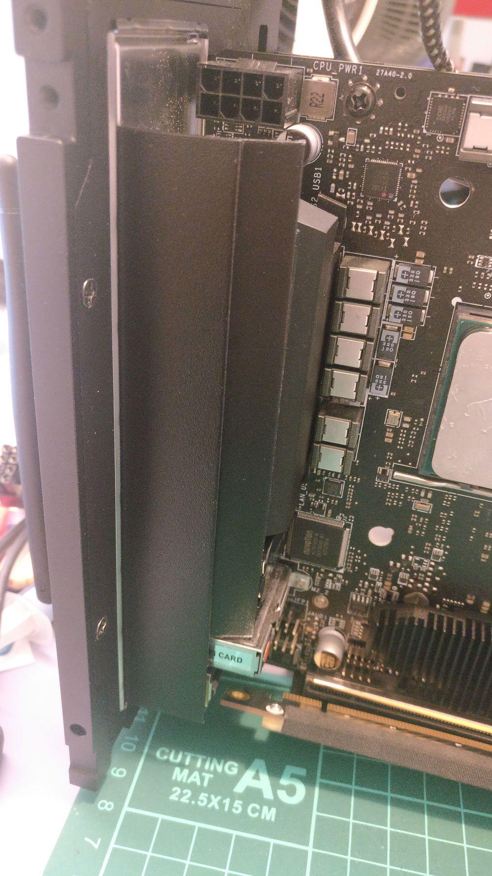 Got my hands on these "graphene coated" aluminum strips, mounted to vrm heatsink with thermal tape.