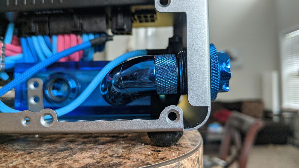 Drilled drain port bulkhead