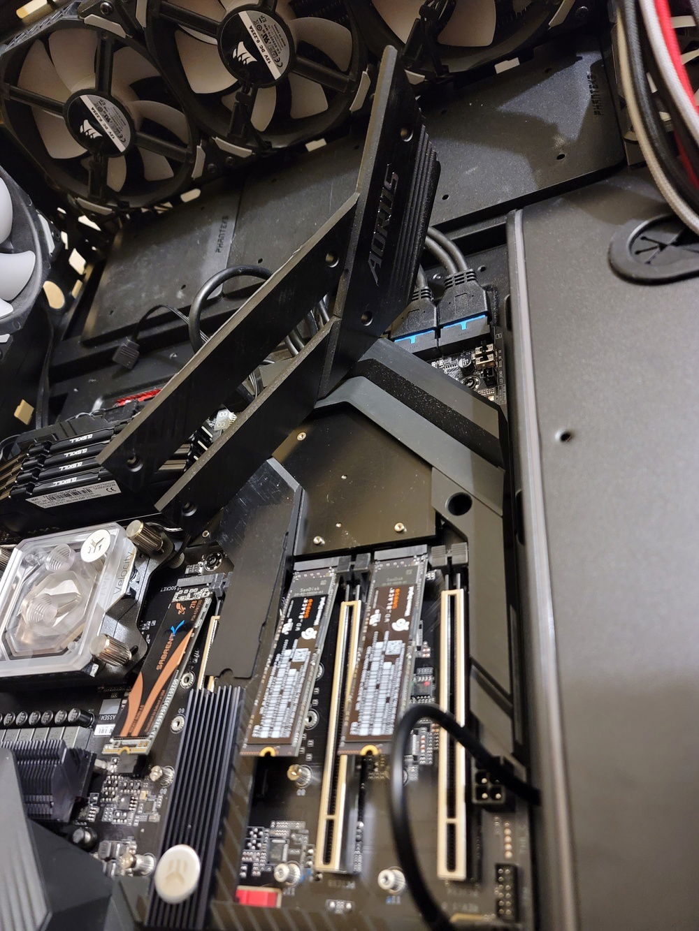 The boards m.2 heat spreader is a thick chunk.