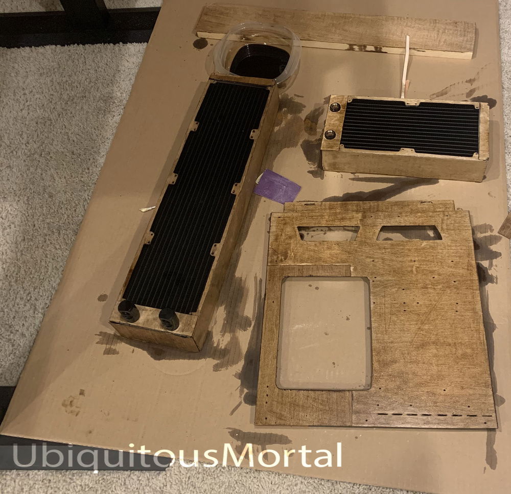 In Progress picture of wrapping the radiators and motherboard tray in maple.