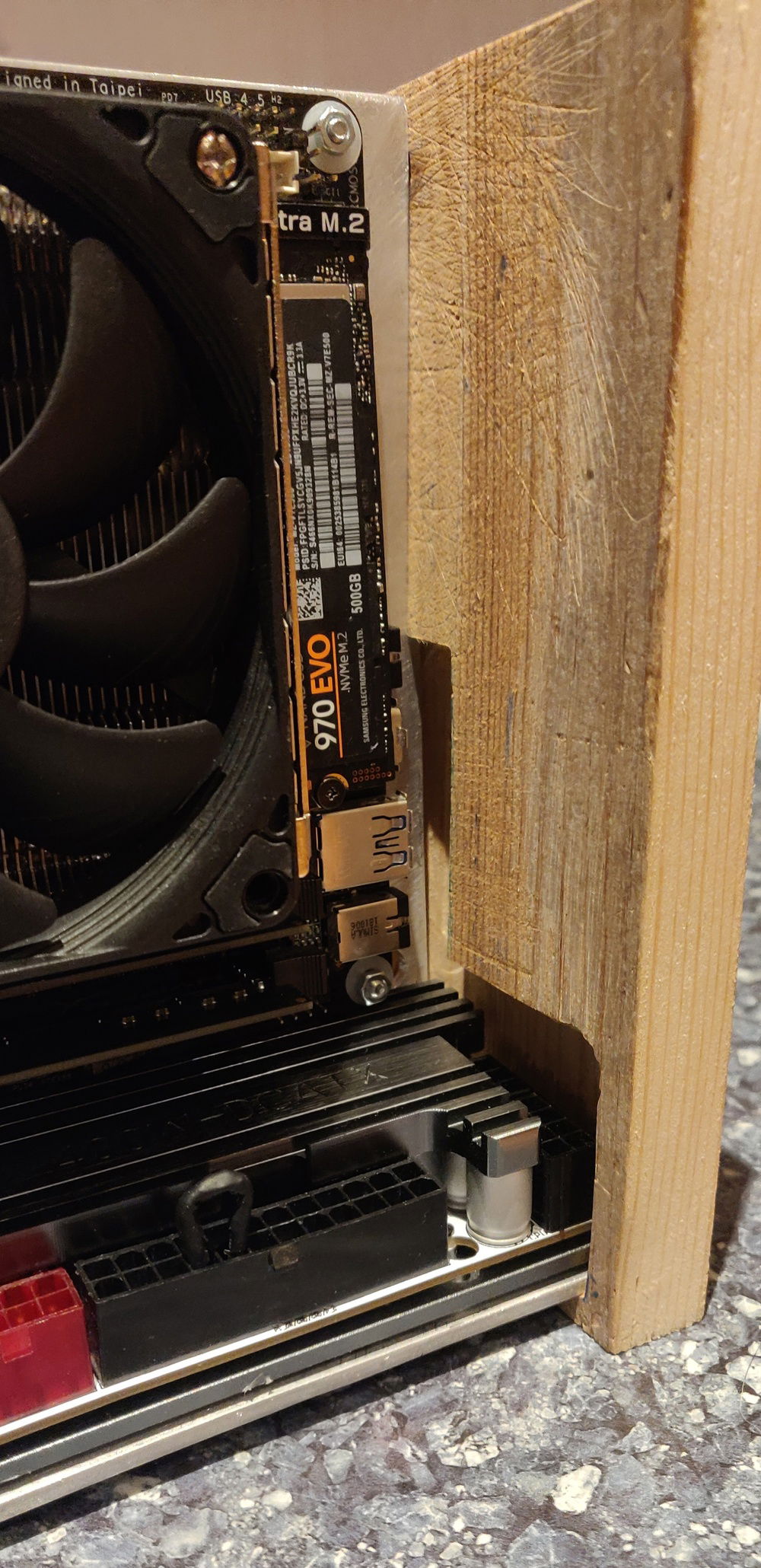 Front side, planning to slot it like that so that it almost lines up with the motherboard, going to add some rubber or something between them too just in case. Front usb ports will be routed to a hub elsewhere once I get my angled adapter cable. This piece really needs some work still