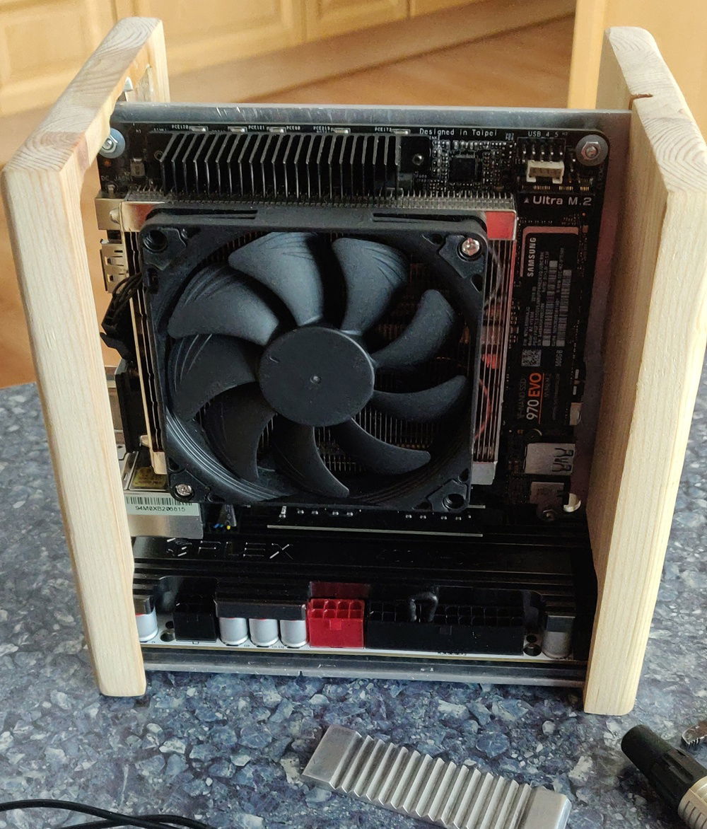 Somewhat works, backside needs to be worked on by either adding some supports or by cutting the motherboard IO shield to be able to make the side wider as it is quite thin now which means I can't drill anything to it without worrying about cracks.