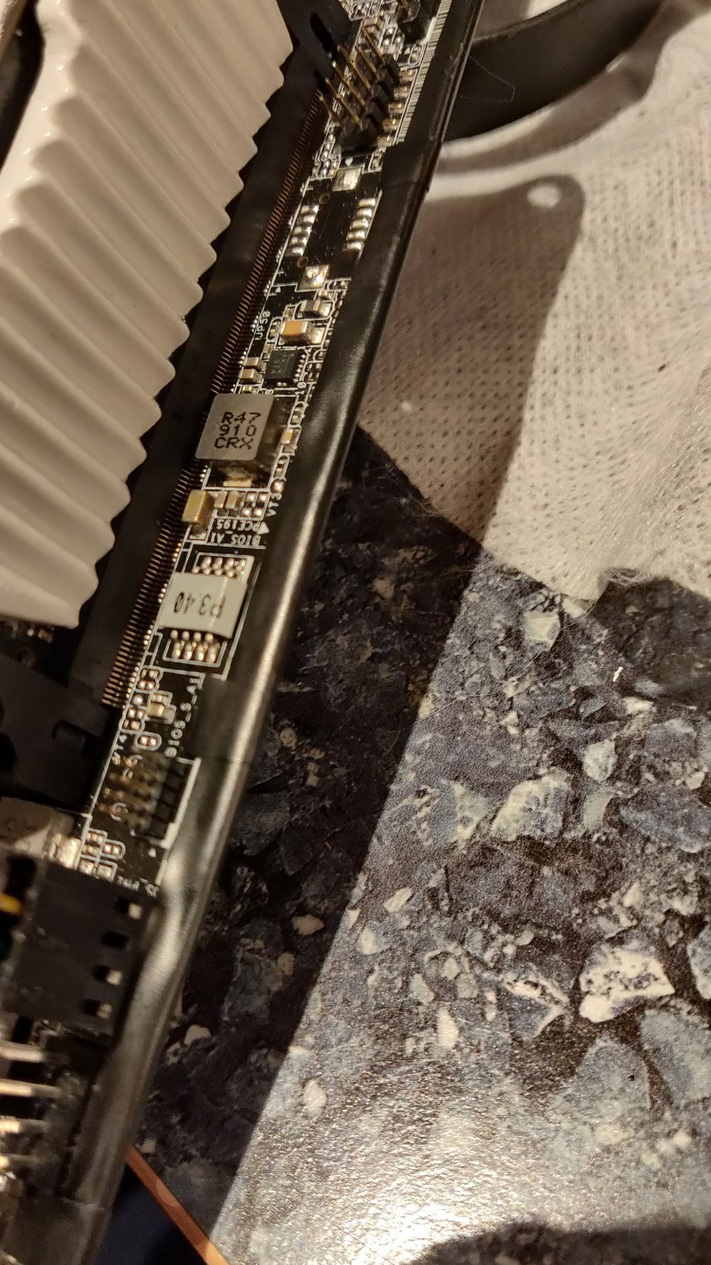 Apply a strip of electric tape just in case as the motherboard is really close to the hdplex. Beware of covering any components.