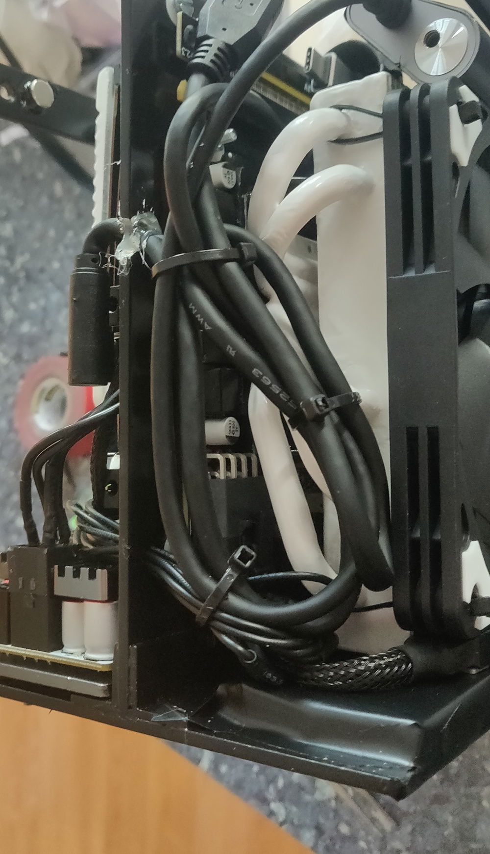 Some hot glue to relieve some tension against the hole and cable "management"