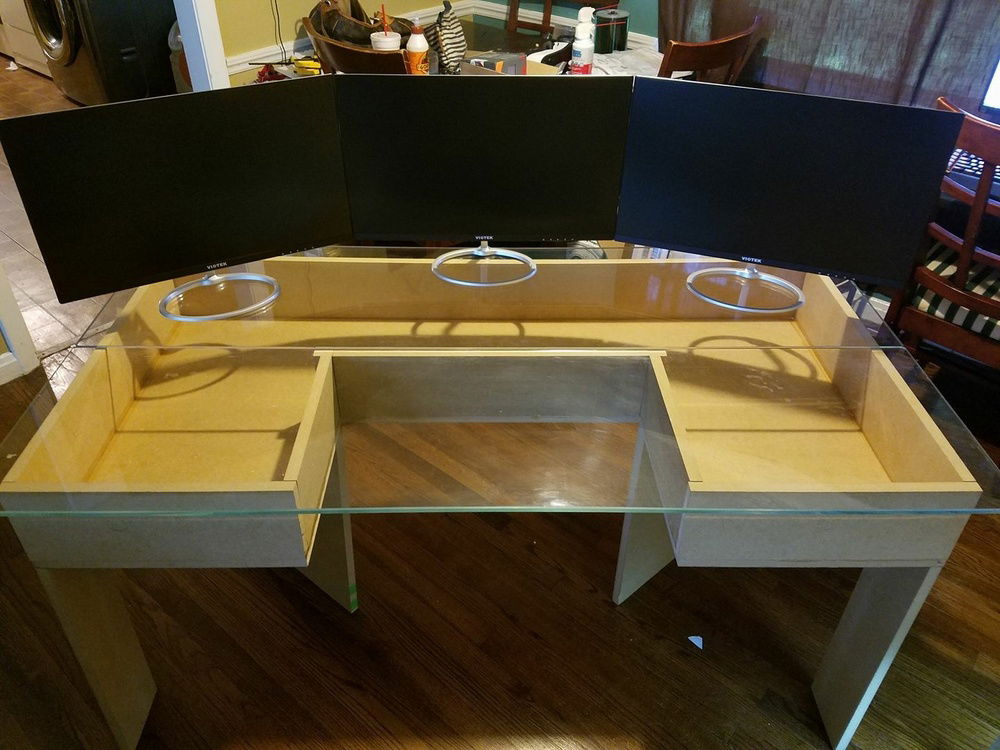 "Built" - obviously not completed.  This was an earlier picture of the desk finally built (took about 3 weeks to complete)