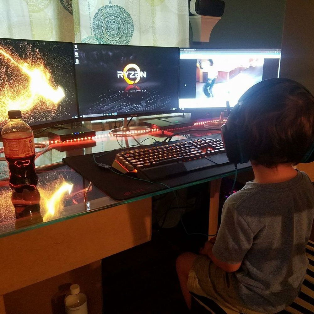 My son sitting at a "finally working" build.  A lot of components have changed since this was taken.