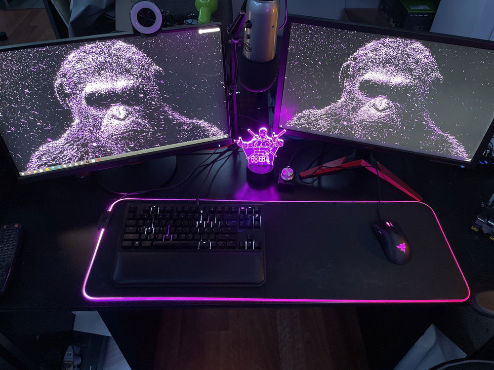 This is my desk and monitor setup.(yes I know Deadpool is red but it didn’t go with the theme)