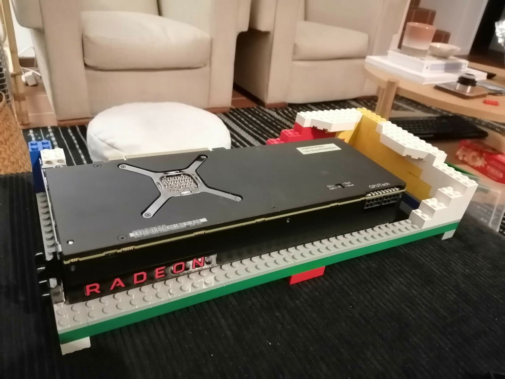 Very tight fit for the Vega. I didn't want to make the case wider just for the power cables, so it would end up sticking out a bit.