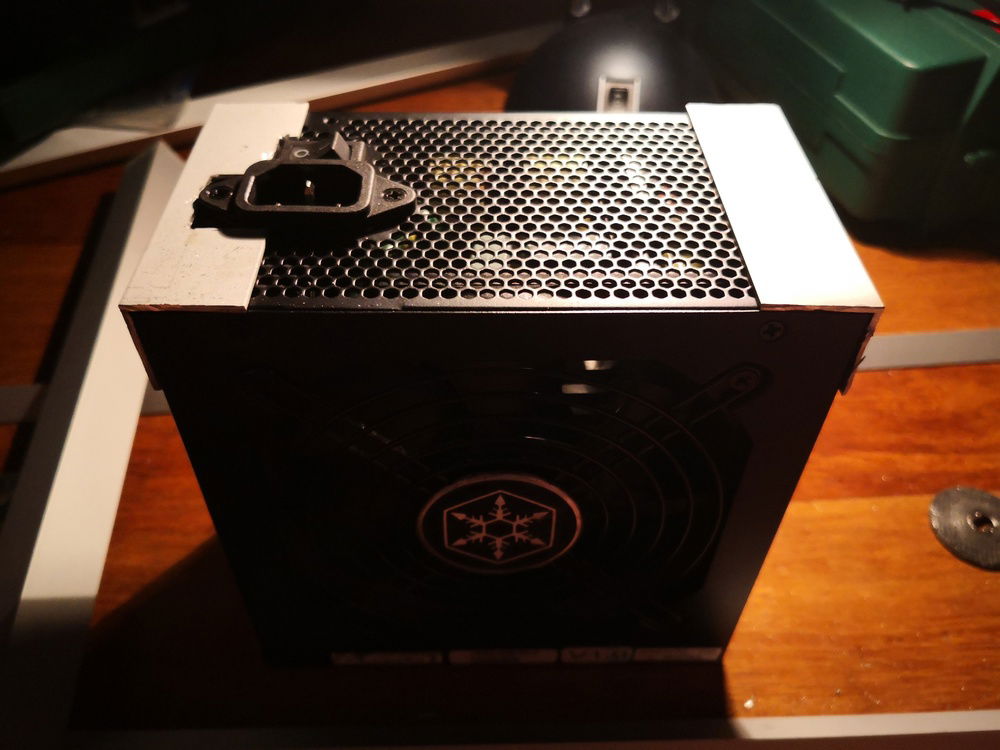 PSU cover body part mounting