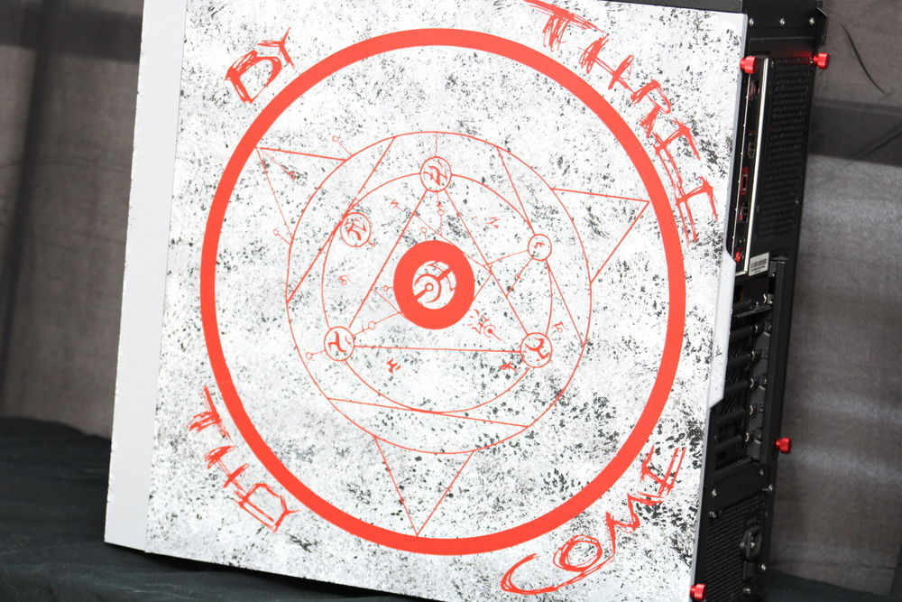 Close up of our side panel which features the summoning circle in the D4 cinematic. It was accomplished by priming and spray painting our panel red. We used a removeable vinyl to create our design. After hand painting the faux stone finished, we moved the vinyl for this fun effect.