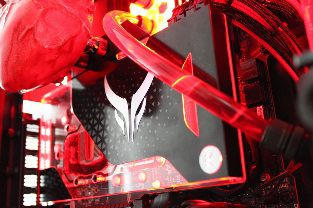 Close up of our PowerColor Liquid Devil Radeon RX 5700 XT. The RGB is set to a double blink which mimics a heartbeat in our system. It is set to red.