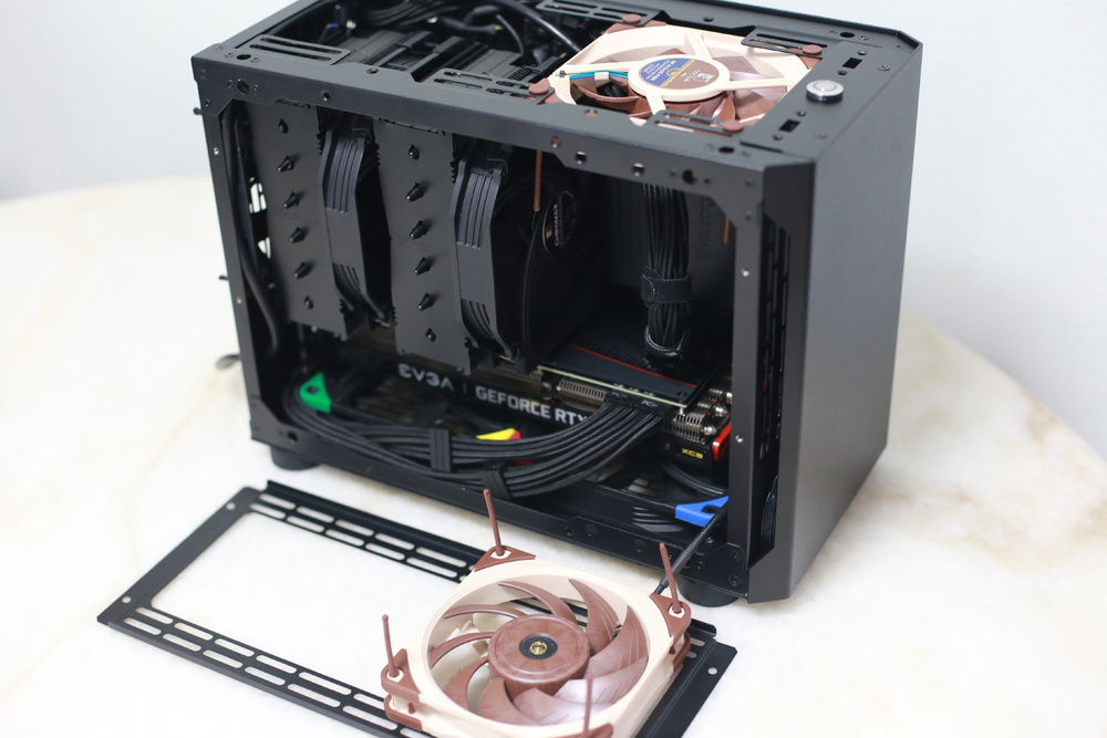 If I ever need extra cooling, I can swap out the window panel with a vented panel and put another NF-A12x25 PWM on the side.