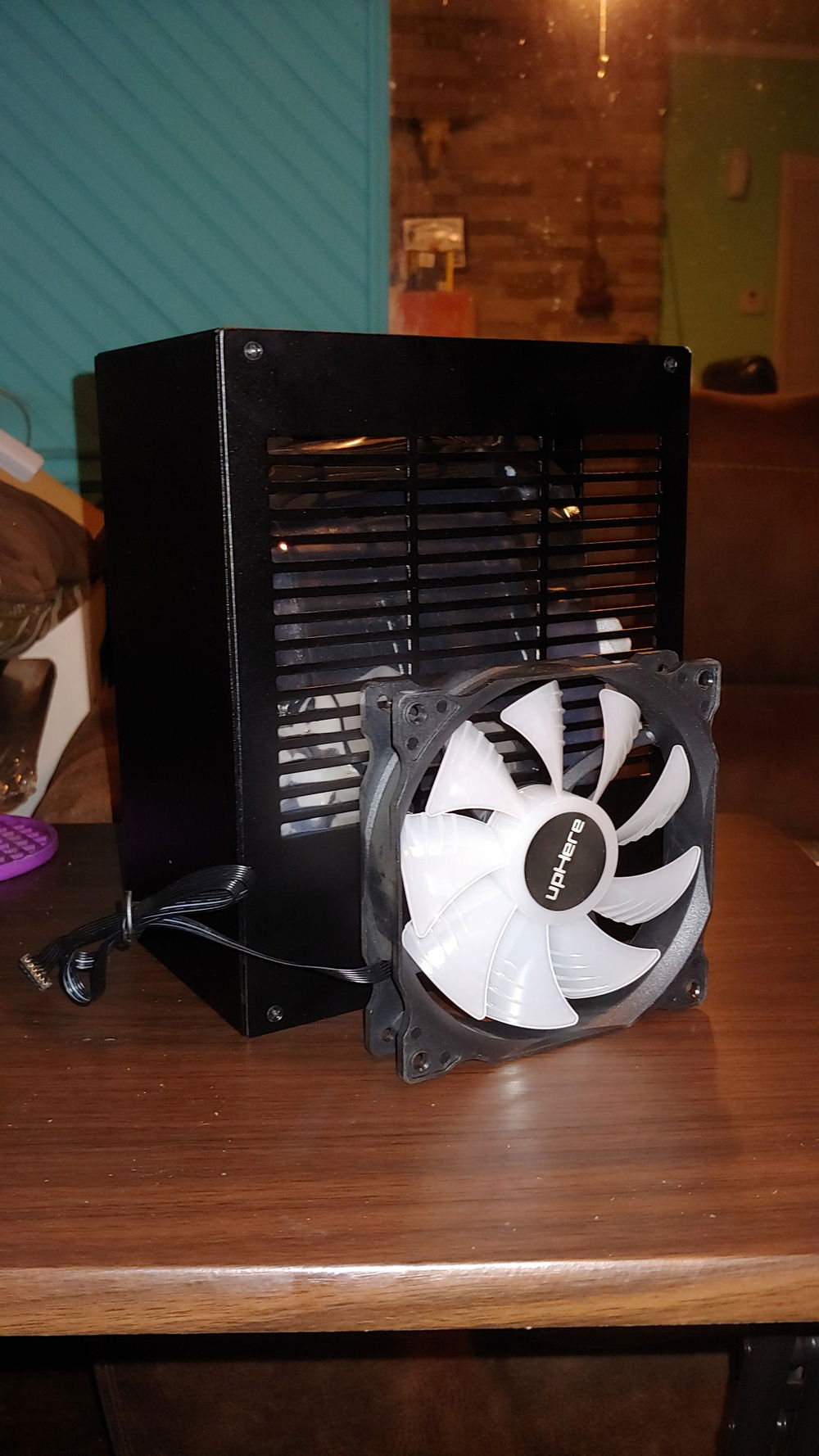 Next to a 120mm fan