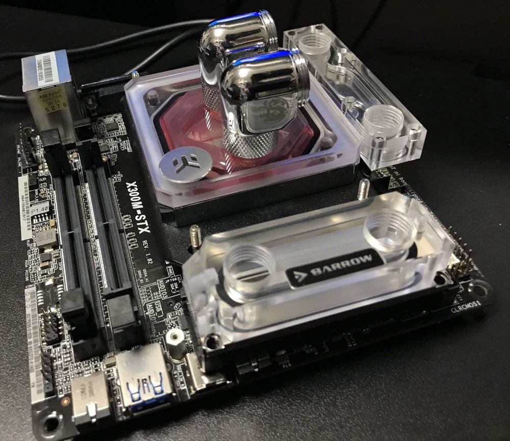 The water cooling block is installed on the X300 motherboard to check the clearance.