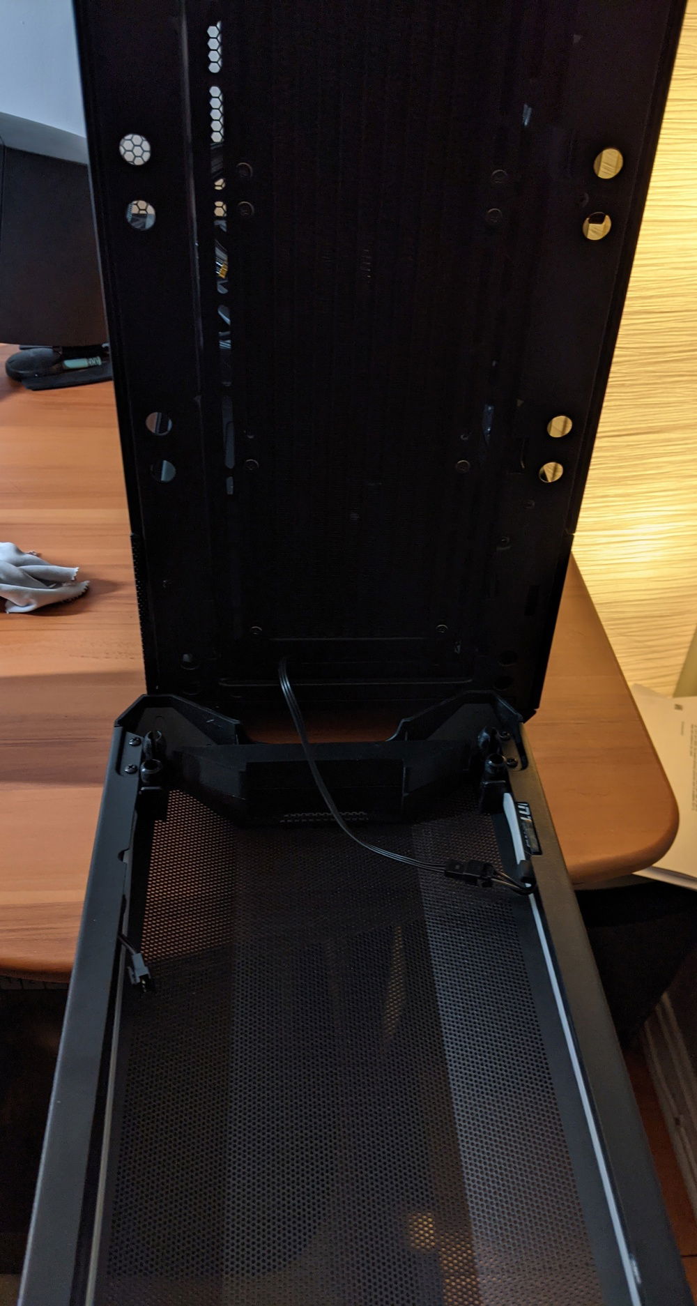 Phanteks Neon strips tucked into the front panel to light up the front, with the RGB cable slid beneath the radiator