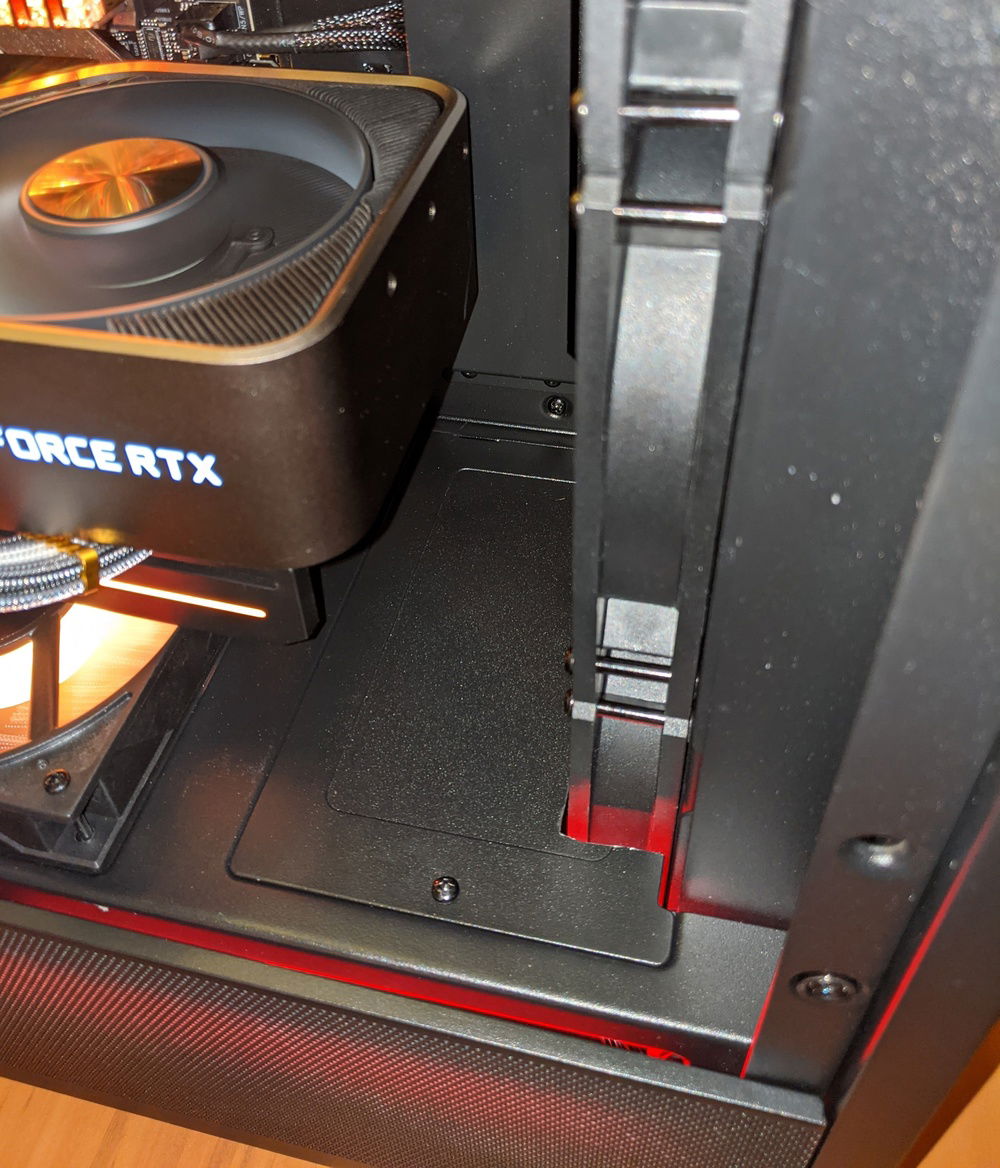 The case mod with lighting on - I like that red shine through!