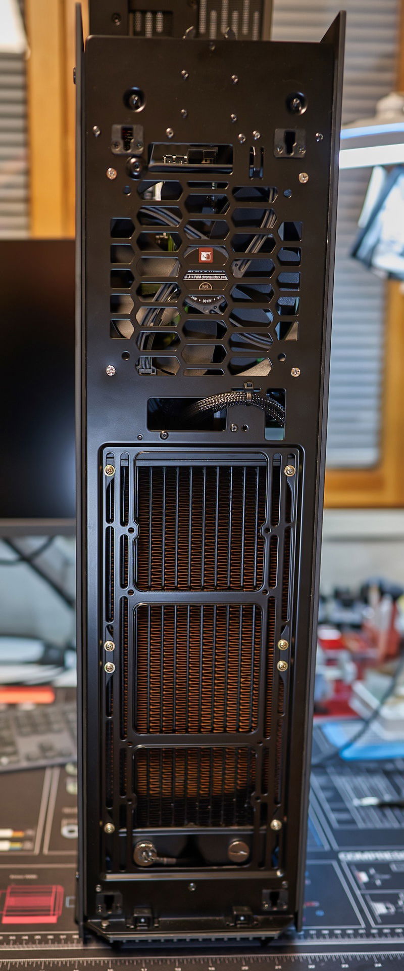 Outlet fans push air from case. Inlet fan at the bottom below the pump and reservoir