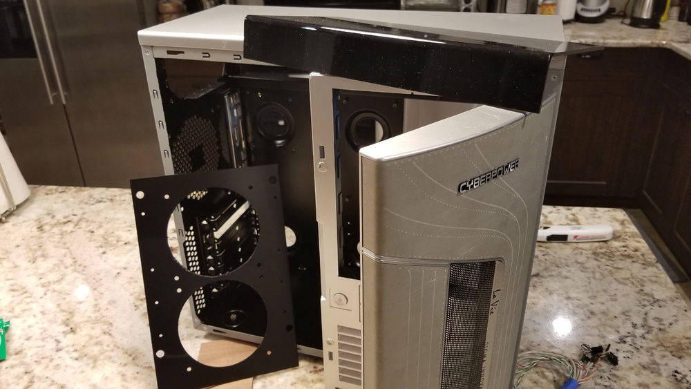 Fan panel and original cable management panel.