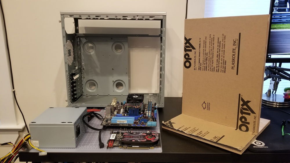 Removed internals and drilled out the rivets holding the hard drive cage as well as the 3.5 and 5.25 drive holders.