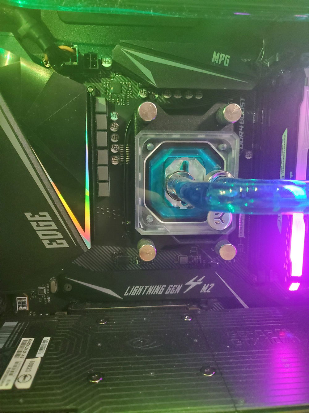 ek-fg block cooling the ryzen 7 3800x cpu on the msi gaming edge wifi motherboard