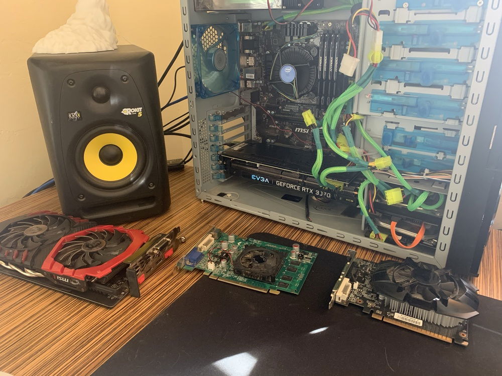 The beginning! Old case and all of the gpus I have gone through in her.