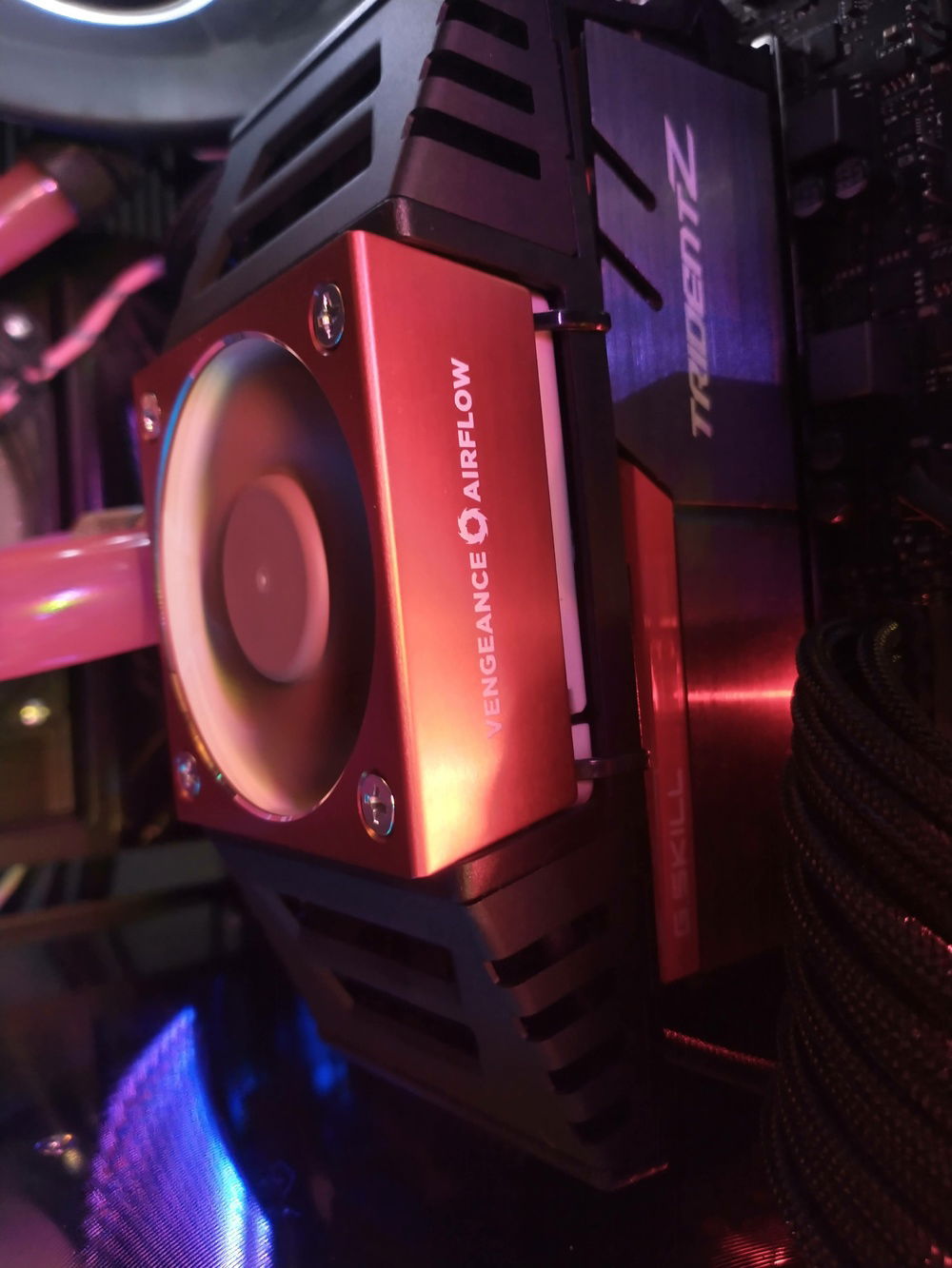 My RAM overclock wasn't stable after going up to 64GB so I added a memory cooler. Stock fan was audible so I swapped it for a slightly thicker Noctua... It's a bit ghetto since it's attached via zip ties.