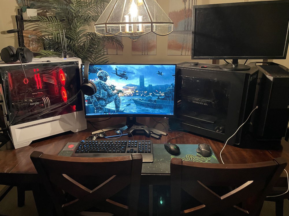 The white Lian Li pc was the one I built for my son for Christmas. The one to the right of the monitor was my old build. The Alienware to the far right was my sons old build, the white build on the far left is replacing that.