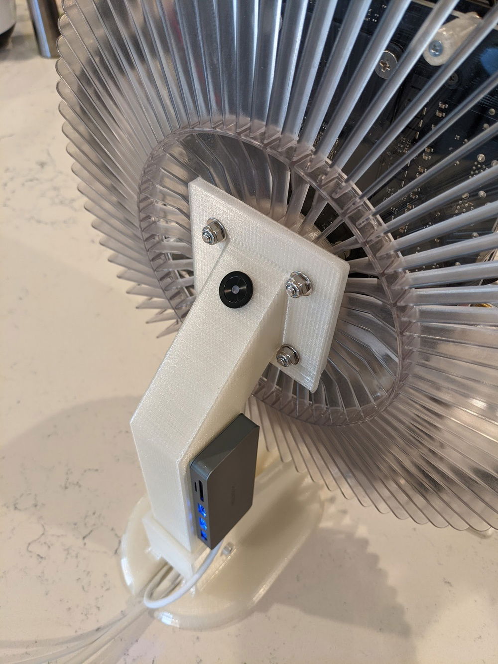 Power button built into the stand.