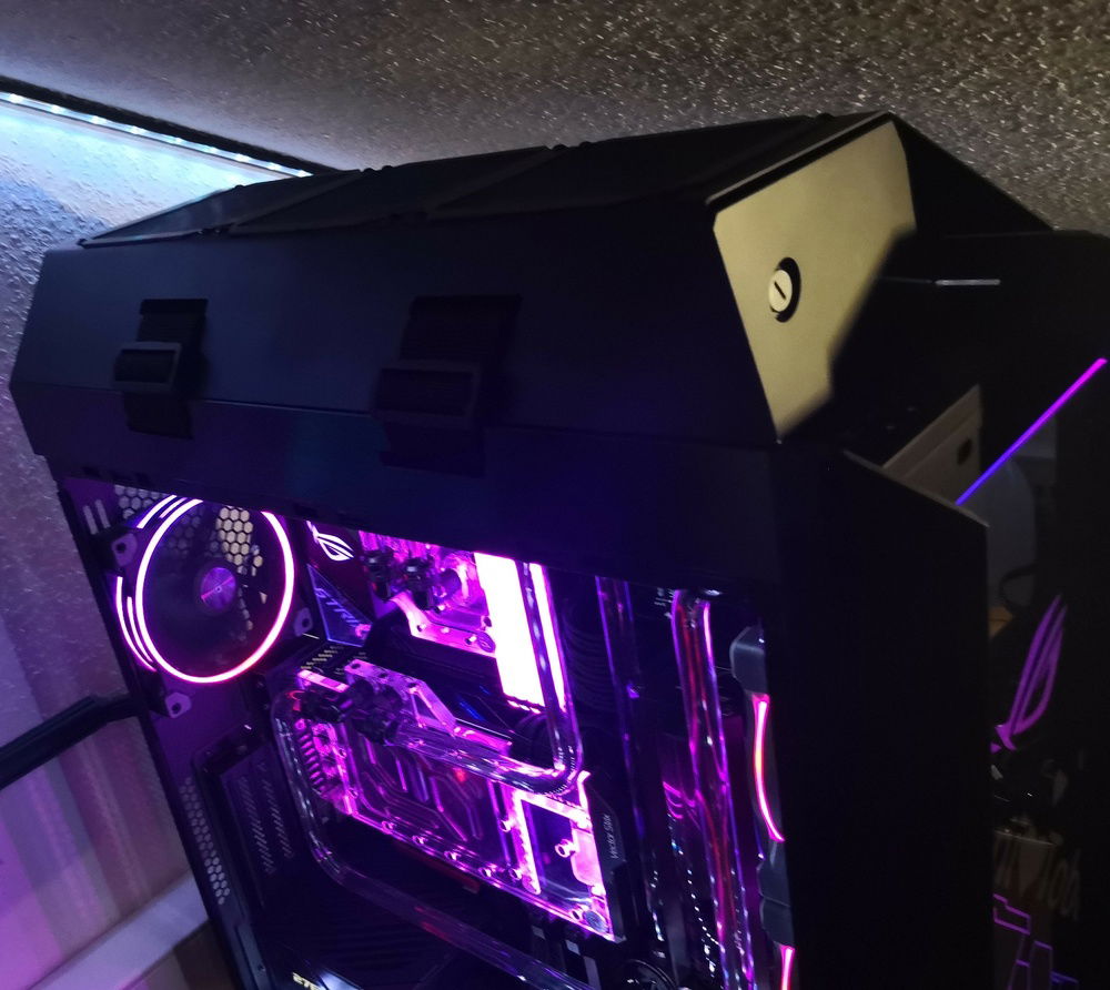 On Top, the Alphacool Monster Radiator wih a custom cover