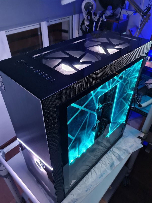 Right side, blue and white illuminated top fans