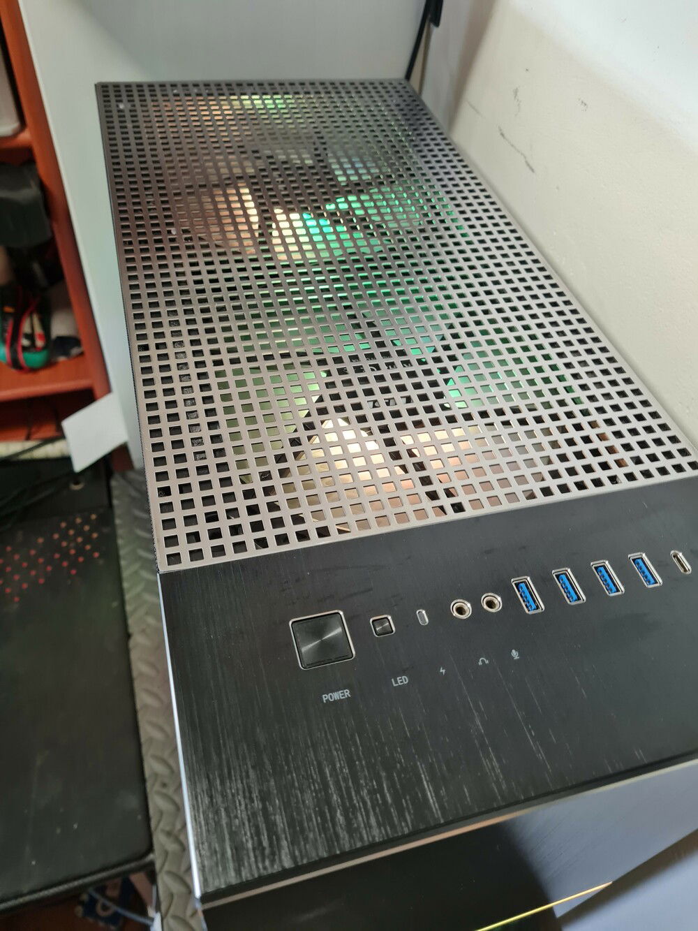 placement of perforated steel grill on top cover to improve airflow.