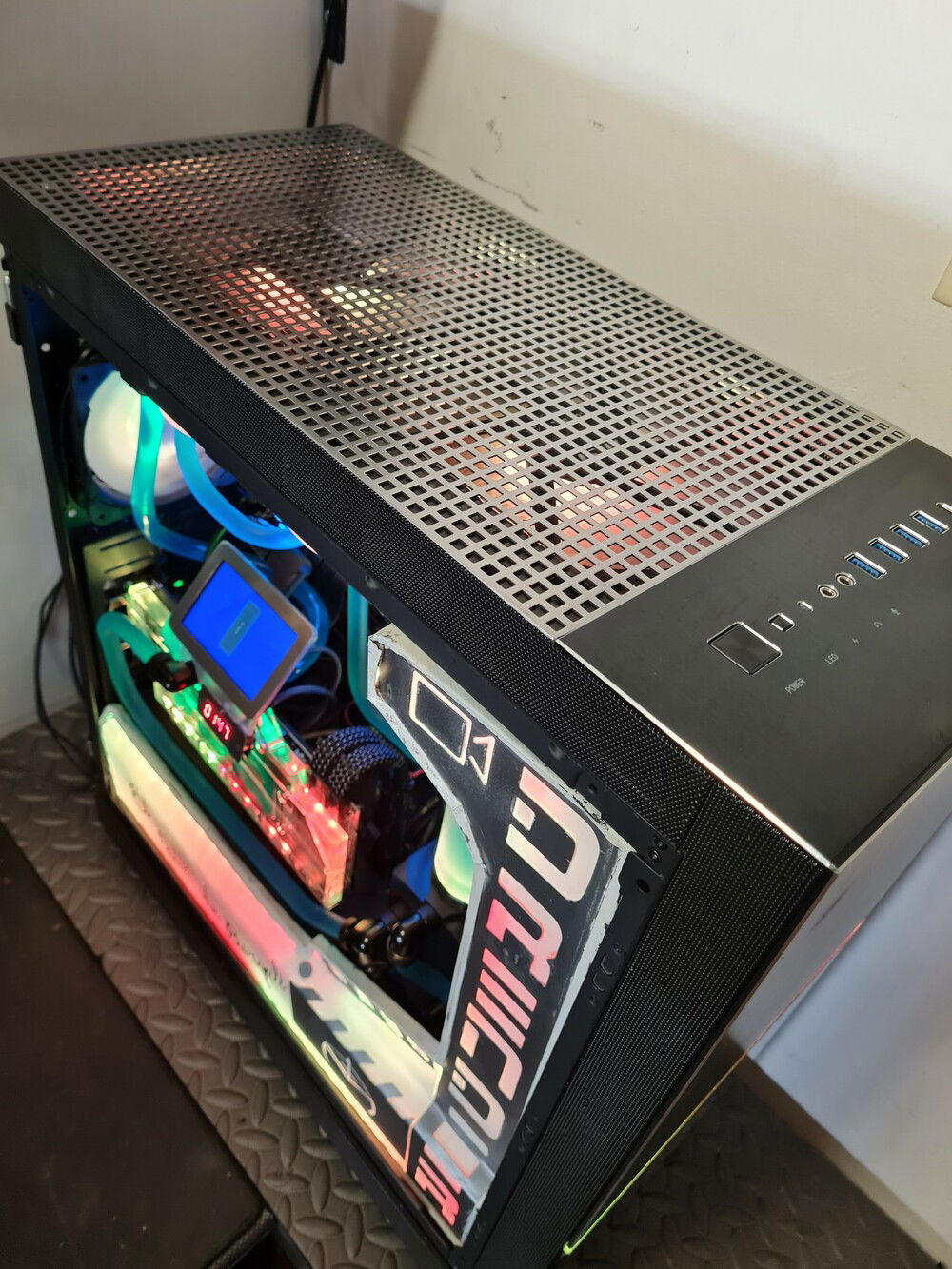 placement of perforated steel grill on top cover to improve airflow.