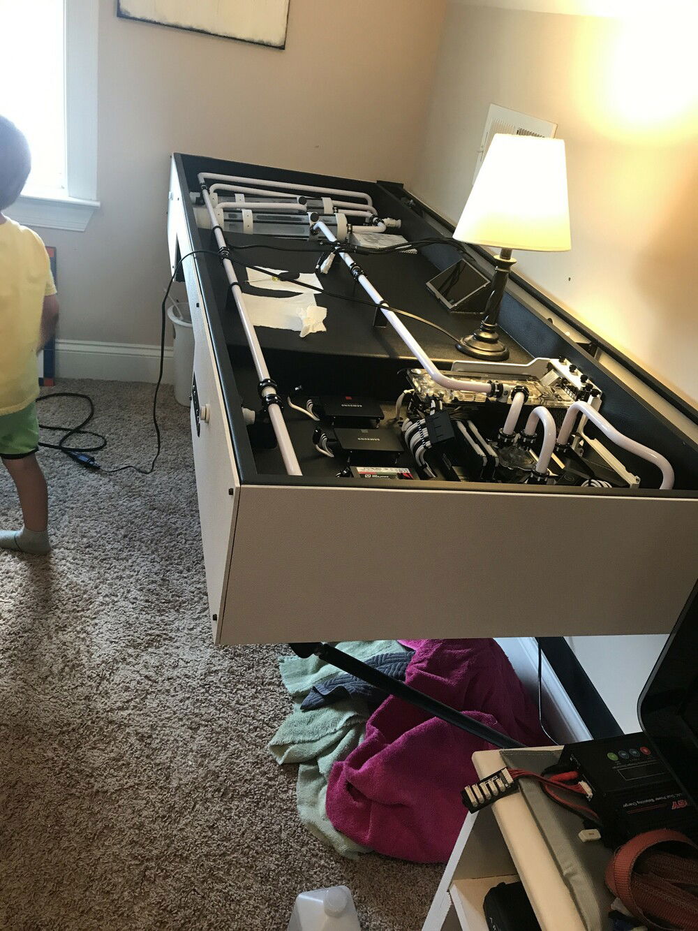 Got the desk installed on the wall and leveled. You can see my job foreman who cracks the whip on me if I slack off.