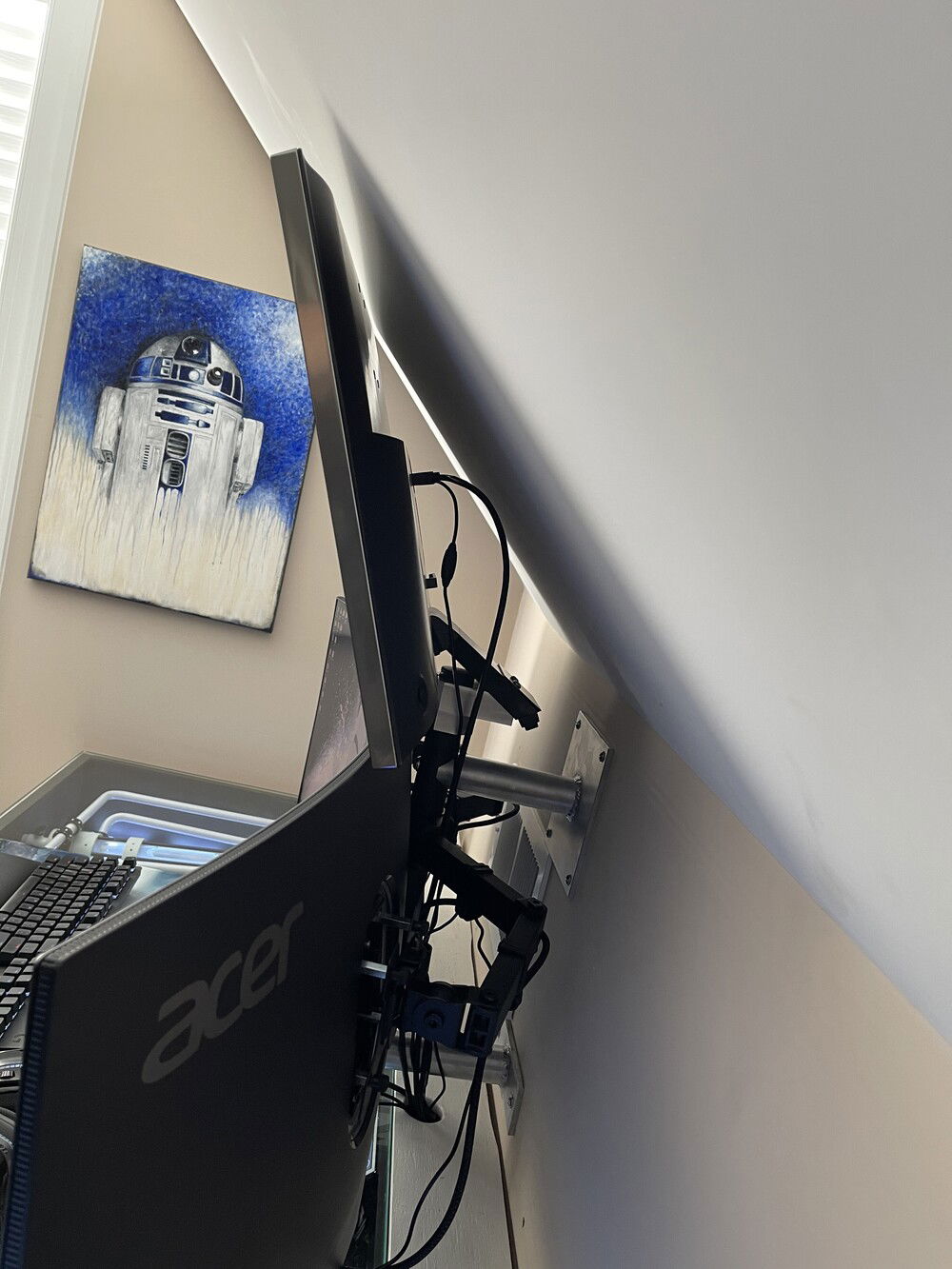 I have it tilted up as high as the roofline will allow. The viewing angle is actually pretty good from my chair