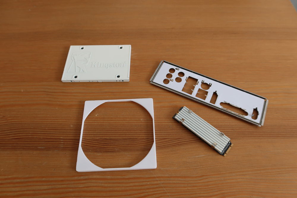 The custom parts. Painted some with paint for heaters, put some vinyl on others, and 3D printed the shroud for the CPU fan.