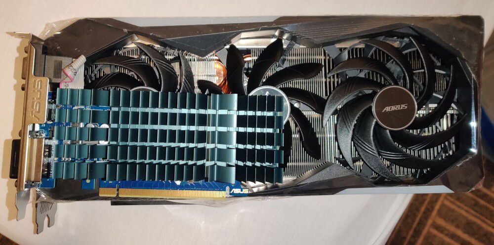 GT 730 looks tiny in comparison - half-height dual-slot vs full-height 3.5-slot