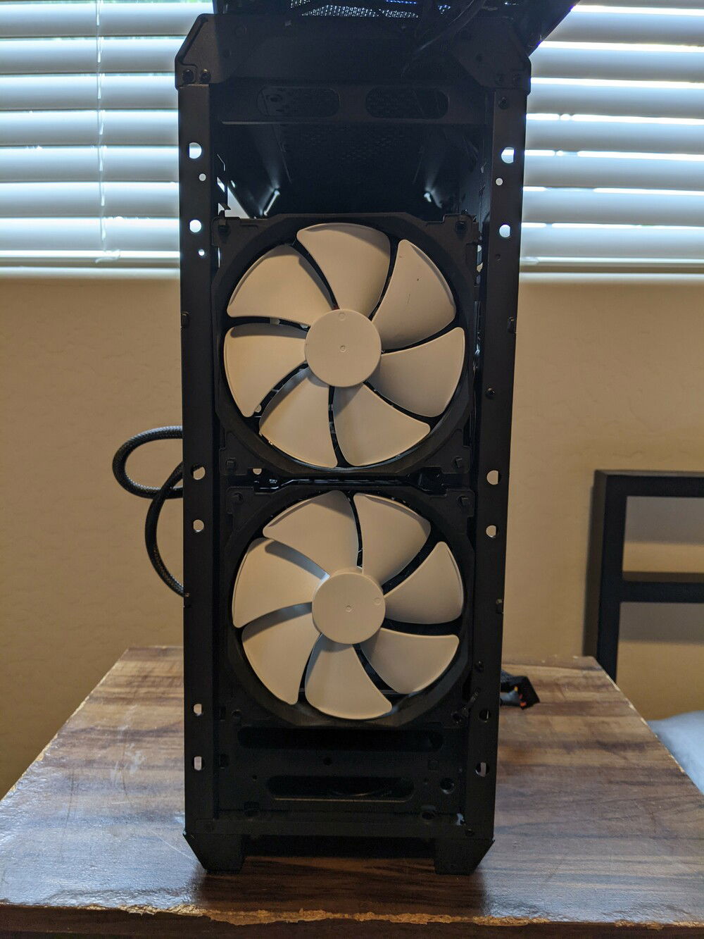 had some extra 140mm fans, so I zip tied them in for some extra air