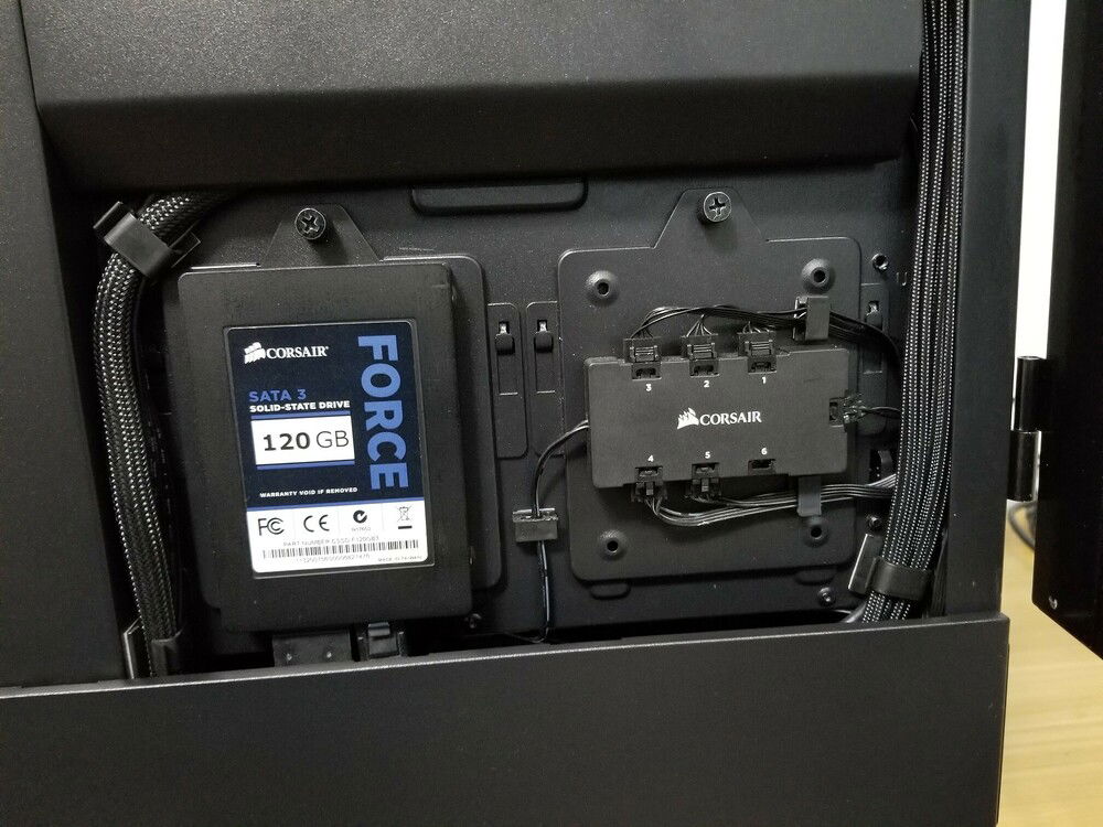 CLose up 120GB StoreMI cache drive and Corsair Lighting Node Pro