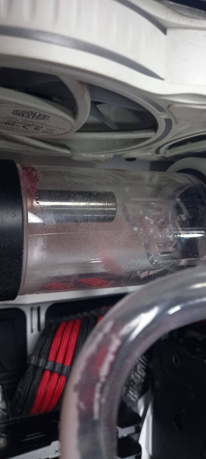 Red pigment settled out of the liquid and stained the pump