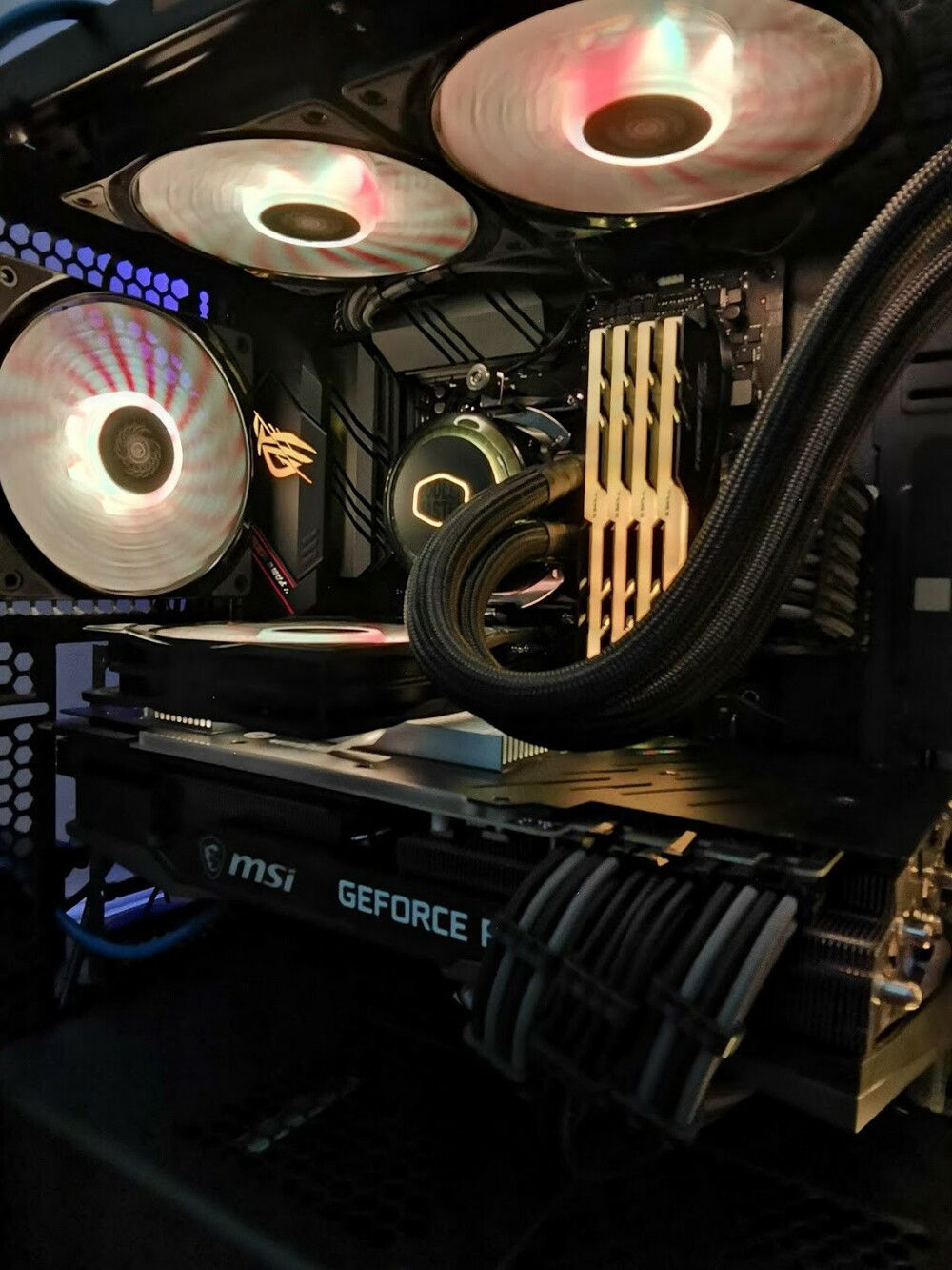 Heatsinks + fan on top of the 3090 to help cool the toasty GDDR6X