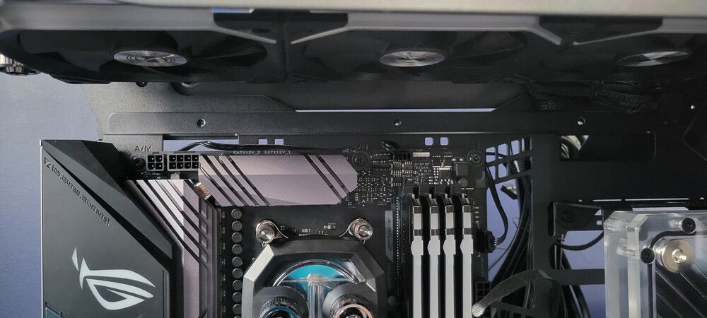 Mounted the rad to the top of the case and have tons of clearance for the motherboard tray.