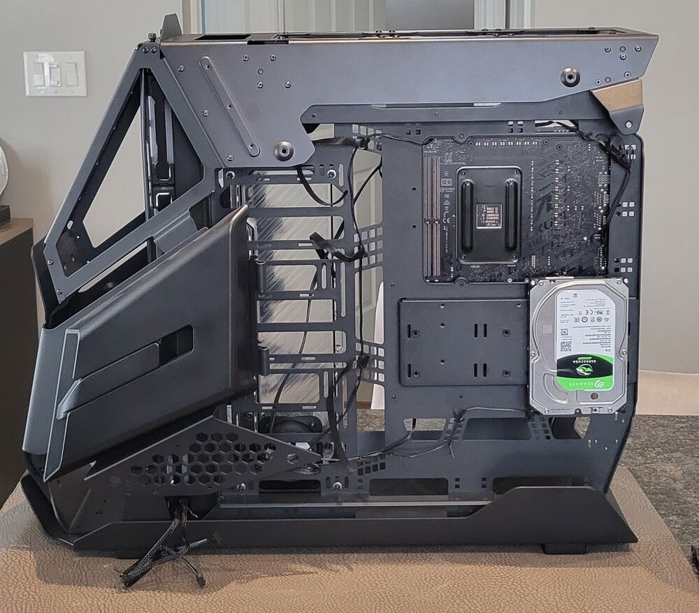 I tried to mound the drive behind the pump/res but the tracks were wider than the shaft of the screws and I couldn't tighten them enough to keep the drive secure. Not sure I'm keen on that much silver being visible so I might need to get some vinyl and cover it.