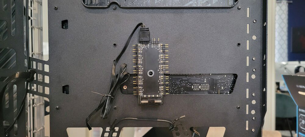 I needed three ARGB headers and the motherboard had two. I didn't want to get a normal splitter and have extra wires to deal with so for $3 CDN more I was able to find this 12-way adapter. It turns one mobo header into 11. I mounted this behind the panel that holds the drive sleds.