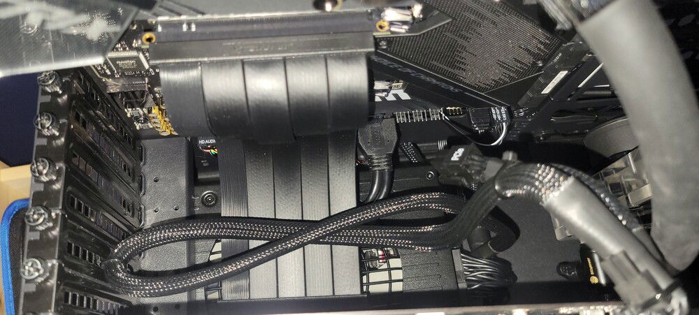 Couldn't figure out a better way to manage the cable for the GPU so I zip tied it to the frame so it isn't visible behind the GPU.